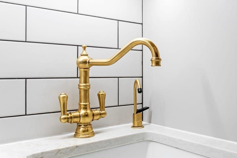 Gold Faucet White Wall Tiles
