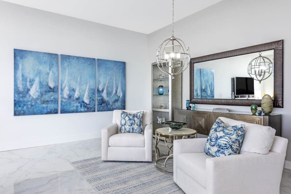 Meg Krakoviac Sail Boats Trio Blue Paintings Biege Arm Chairs Marble Floor