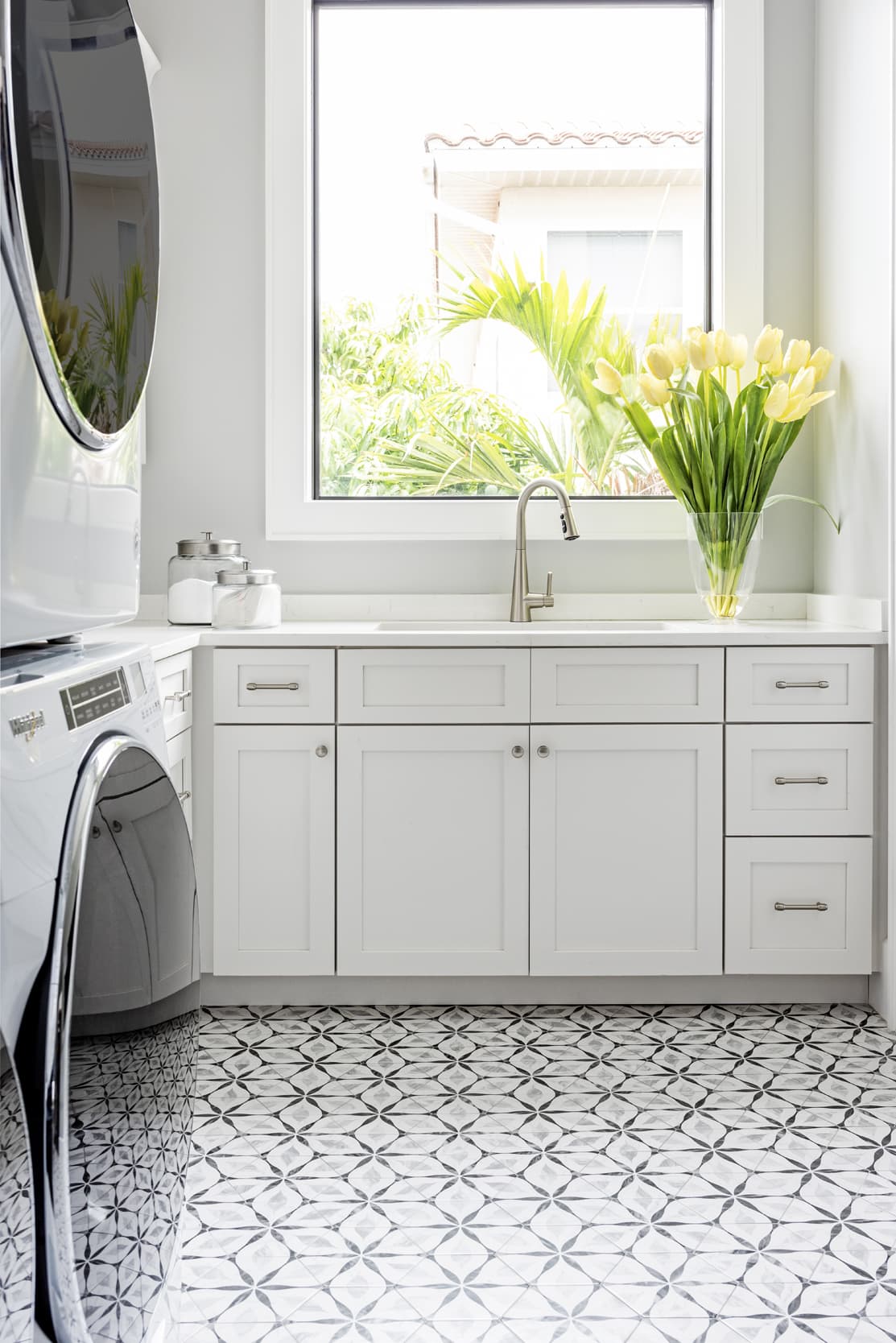 White Laundry Room White Cabinets Yellow Tulips