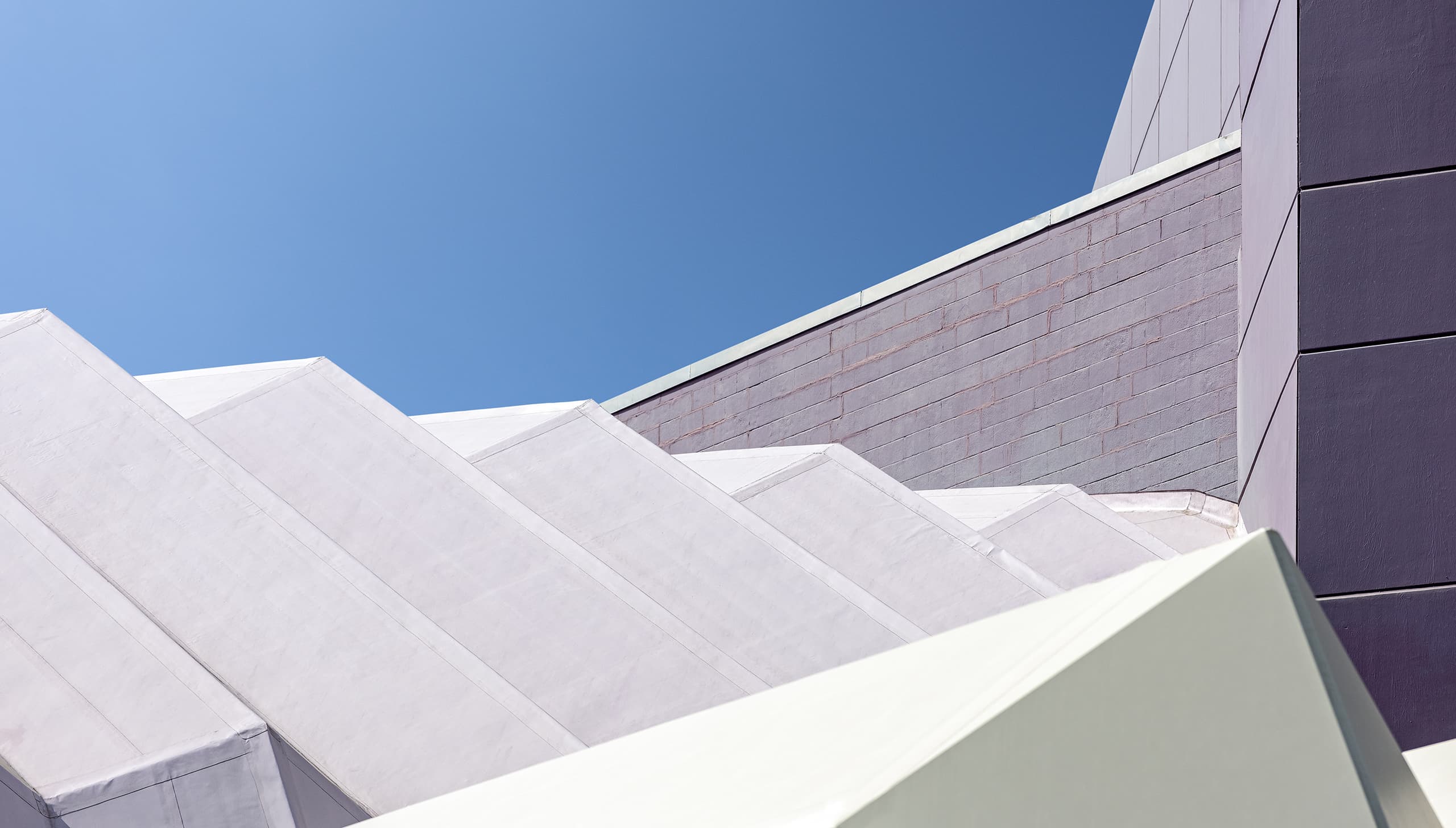 Van Wezel Sarasota Shell Shaped Roof Purple Brick Building Blue Sky