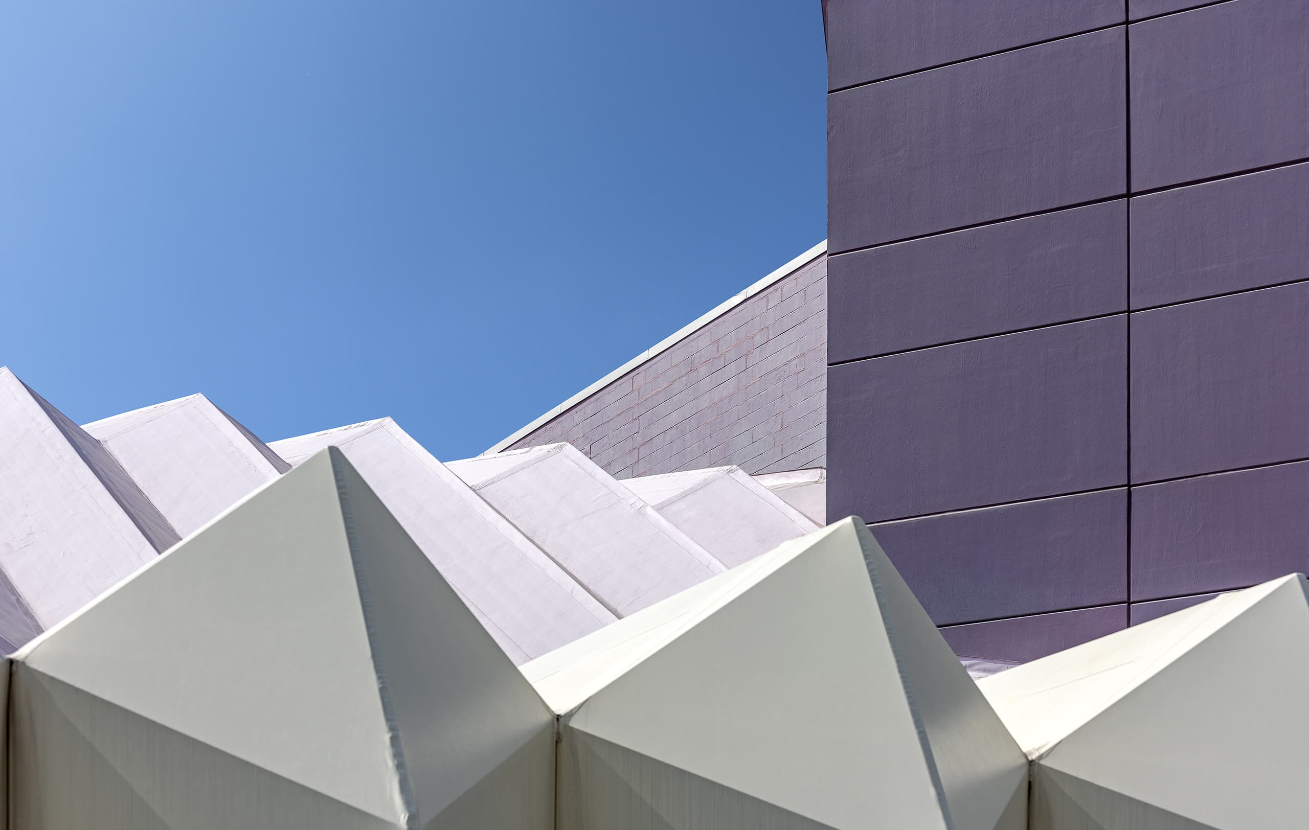 Van Wezel Sarasota Triangular Shaped White Canopy Purple Panel Body Building Blue Sky