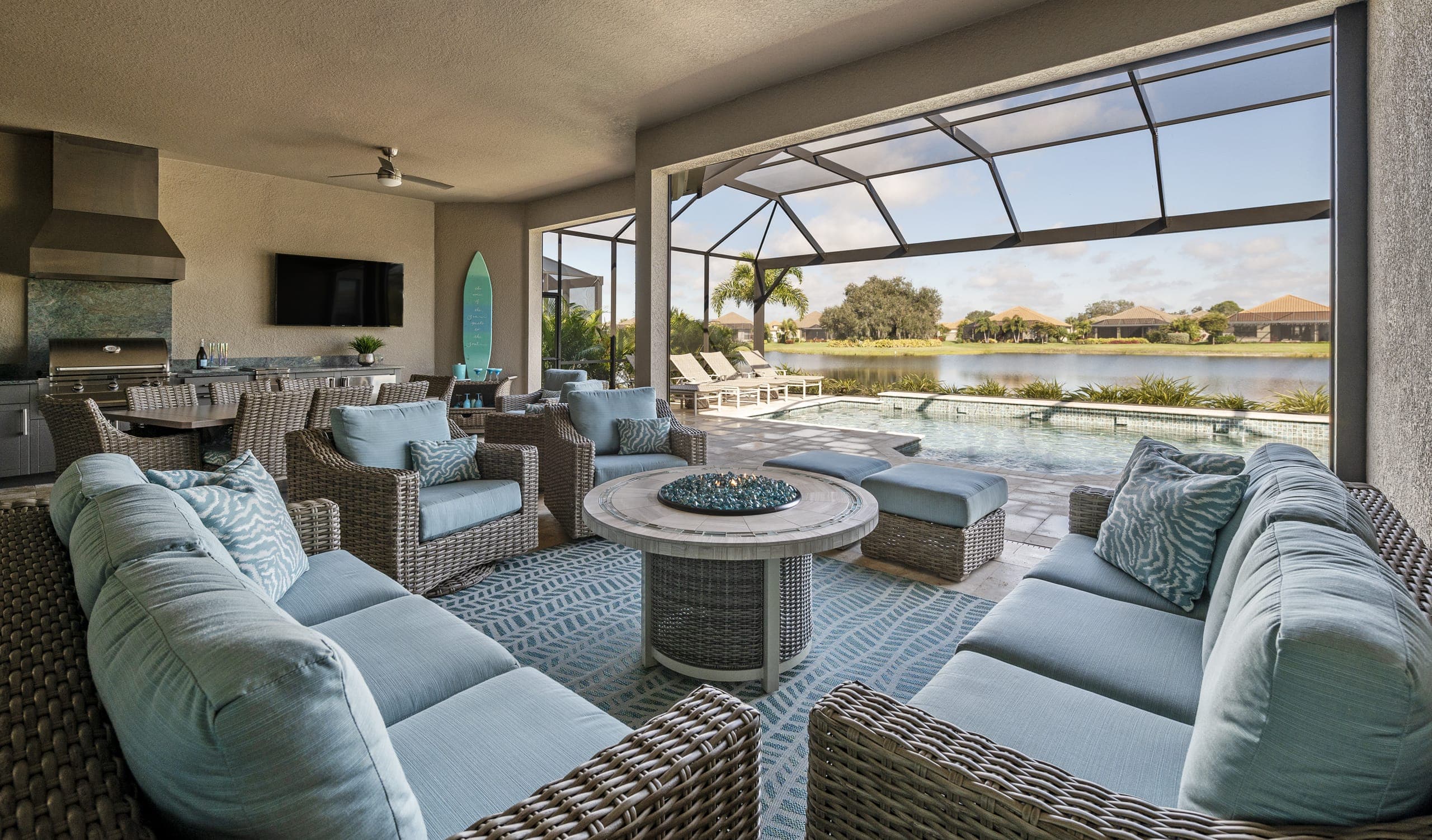 Teal Wicker Outdoor Funiture Fire Table Pool View