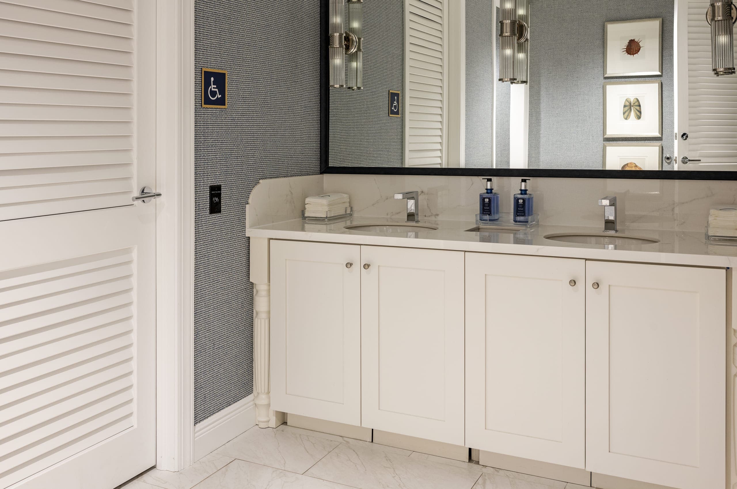 Dual Sink Area With White Cabinet And White Slated Door Blue Texture Cross Hatch Wall