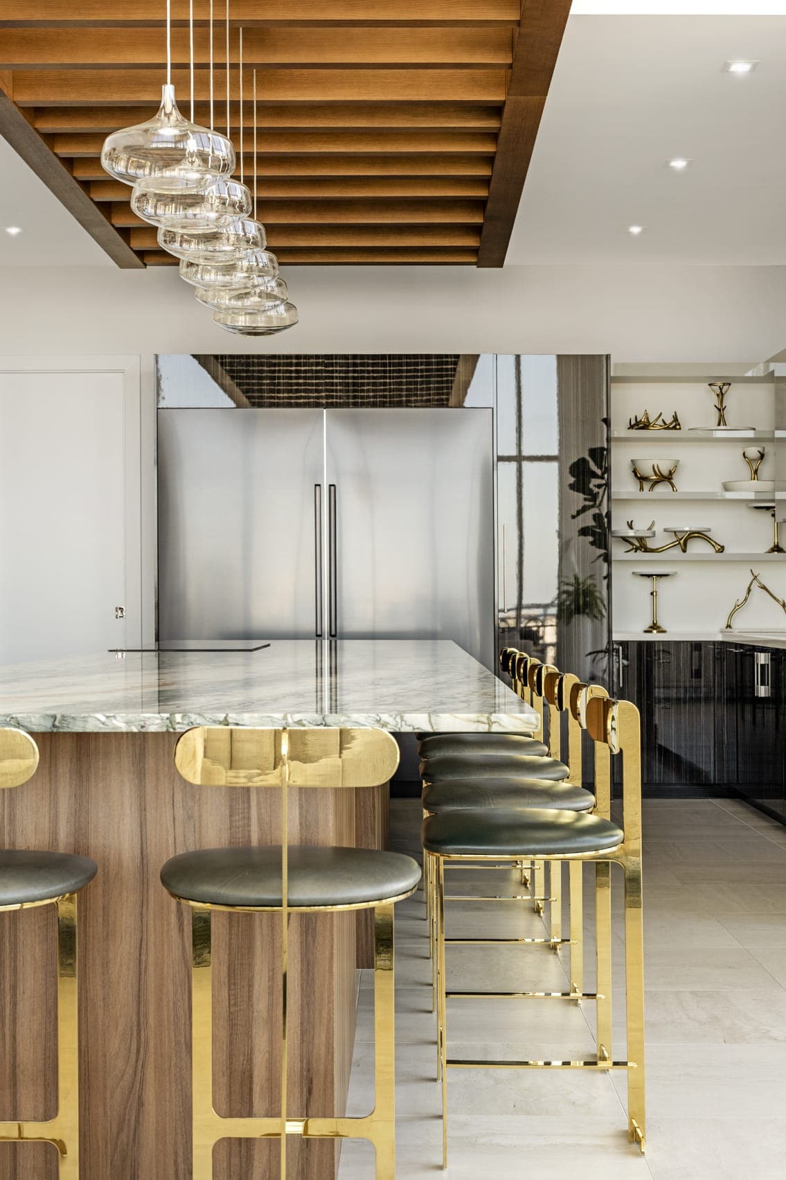 Jkl Penthouse The Blvd Contemporary White Kitchen Wood Canopy Brass And Black Leather High Chairs Stone Island