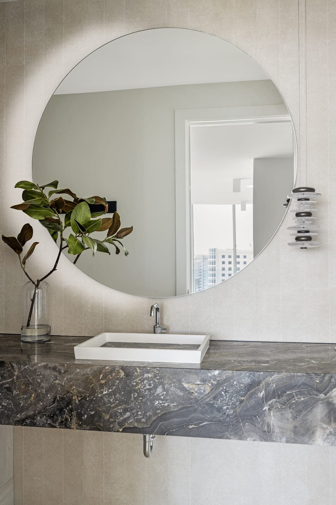 Jkl Penthouse The Blvd Grey Tile Powder Bath With Granite Countertop Circular Mirror