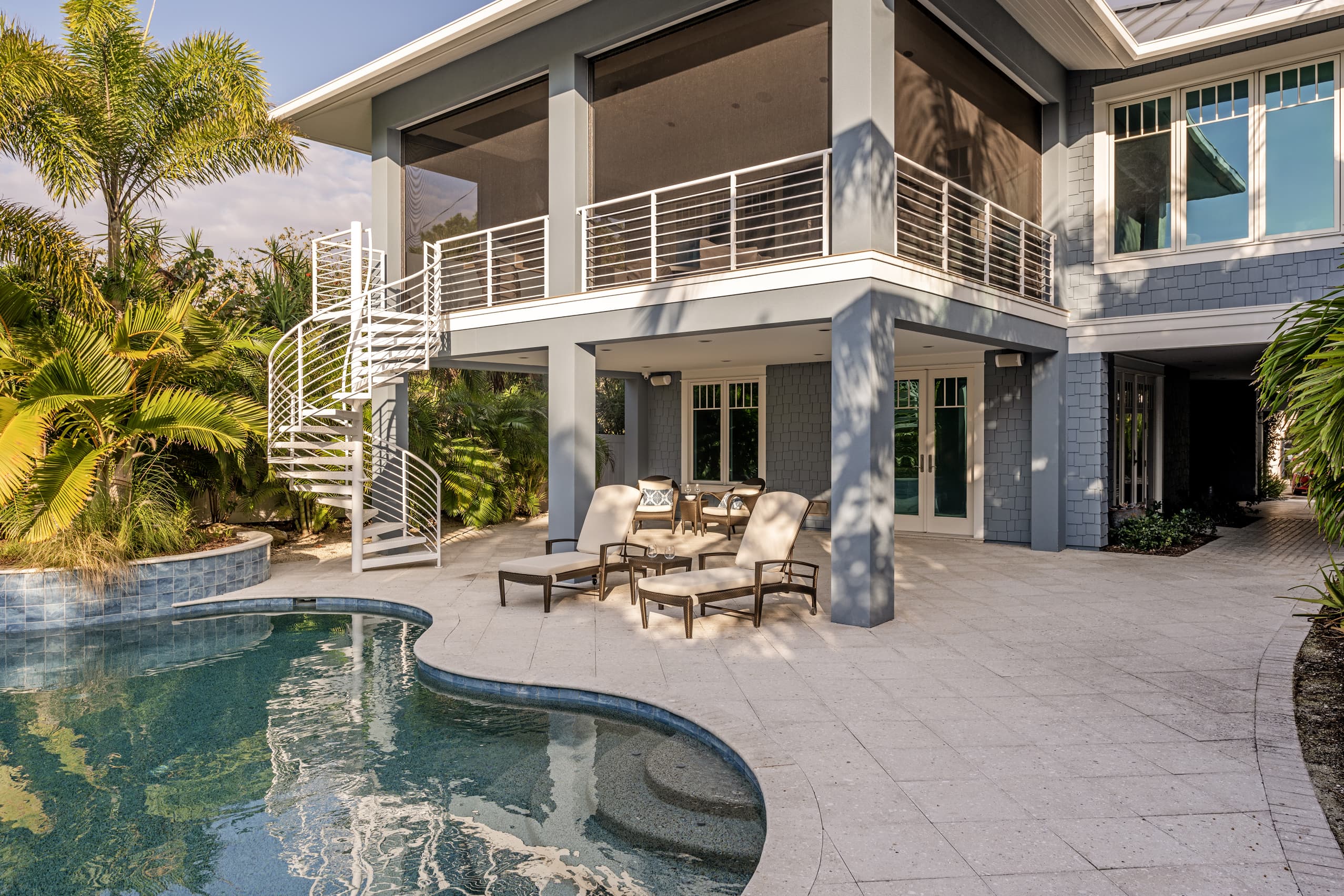 Rear Exterior Three Quater View Palm Trees Pool Sunlouges Spiral Staircase